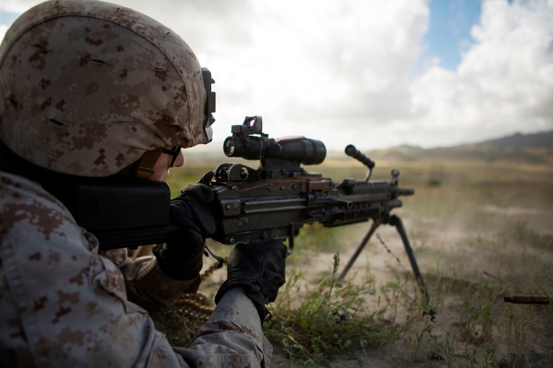 Marine Corps Base Camp Pendleton, Calif. – Lance Cpl. Madison A. Delamain sends rounds down range with an M240B machine gun during a Combat Marksmanship Program at Camp Pendleton March 29, 2016. The CMP shoot is a part of the 1st Marine Expeditionary Brigade’s contingency training and preparation for the Special Purpose Marine Air-Ground Task Force Crisis Response Central Command. Delamain, a native of New Braunfels, Texas, is a military policewoman with Company A, 1st Law Enforcement Battalion, I Marine Expeditionary Force. (U.S Marine Corps photo by Lance Cpl. Justin E. Bowles/ Released)