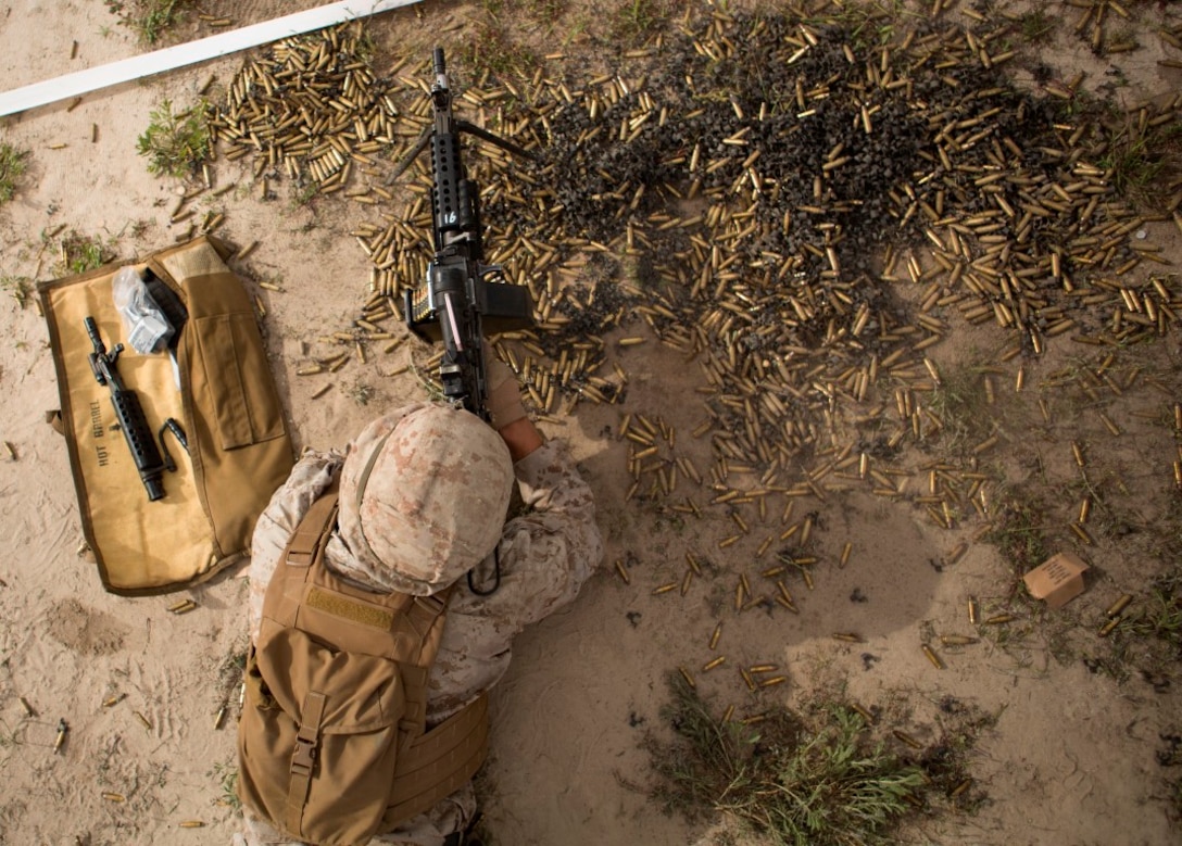 Marine Corps Base Camp Pendleton, Calif. – Lance Cpl. Kevin J. Earley sends rounds down range with an M240B machine gun during a Combat Marksmanship Program at Camp Pendleton March 29, 2016. The CMP shoot is a part of Marine Expeditionary Brigade’s contingency training and preparation for the Special Purpose Marine Air-Ground Task Force Crisis Response Central Command. Earley is a military policeman with Company A, 1st Law Enforcement Battalion, I Marine Expeditionary Force. (U.S Marine Corps photo by Lance Cpl. Justin E. Bowles/ Released)