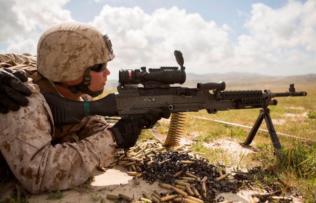 Marine Corps Base Camp Pendleton, Calif. – Cpl. Daniel J. Bates Jr. looks over the sights of an M240B machine gun during a Combat Marksmanship Program at Camp Pendleton March 29, 2016. The CMP shoot is a part of 1st Marine Expeditionary Brigade’s contingency training and preparation for the Special Purpose Marine Air-Ground Task Force Crisis Response Central Command. Bates Jr., a native of St. John, Indiana, is a military policeman with Company A, 1st Law Enforcement Battalion, I Marine Expeditionary Force. (U.S Marine Corps photo by Lance Cpl. Justin E. Bowles/ Released)