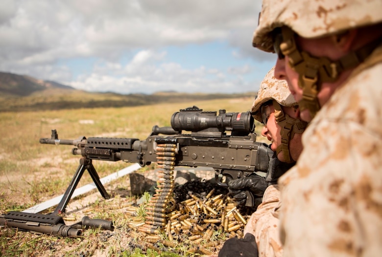 Marine Corps Base Camp Pendleton, Calif. – Pfc. Emilio E. McDaniel sends rounds down range with an M240B machine gun during a Combat Marksmanship Program at Camp Pendleton March 29, 2016. The CMP shoot is a part of the 1st Marine Expeditionary Brigade’s contingency training and preparation for the Special Purpose Marine Air-Ground Task Force Crisis Response Central Command. McDaniel, a native of Harlan, Iowa, and his assistant gunner, Pfc. Evan Dooner, a native of Egg Harbor, New Jersey, are military policemen with Company A, 1st Law Enforcement Battalion, I Marine Expeditionary Force. (U.S Marine Corps photo by Lance Cpl. Justin E. Bowles/ Released)
