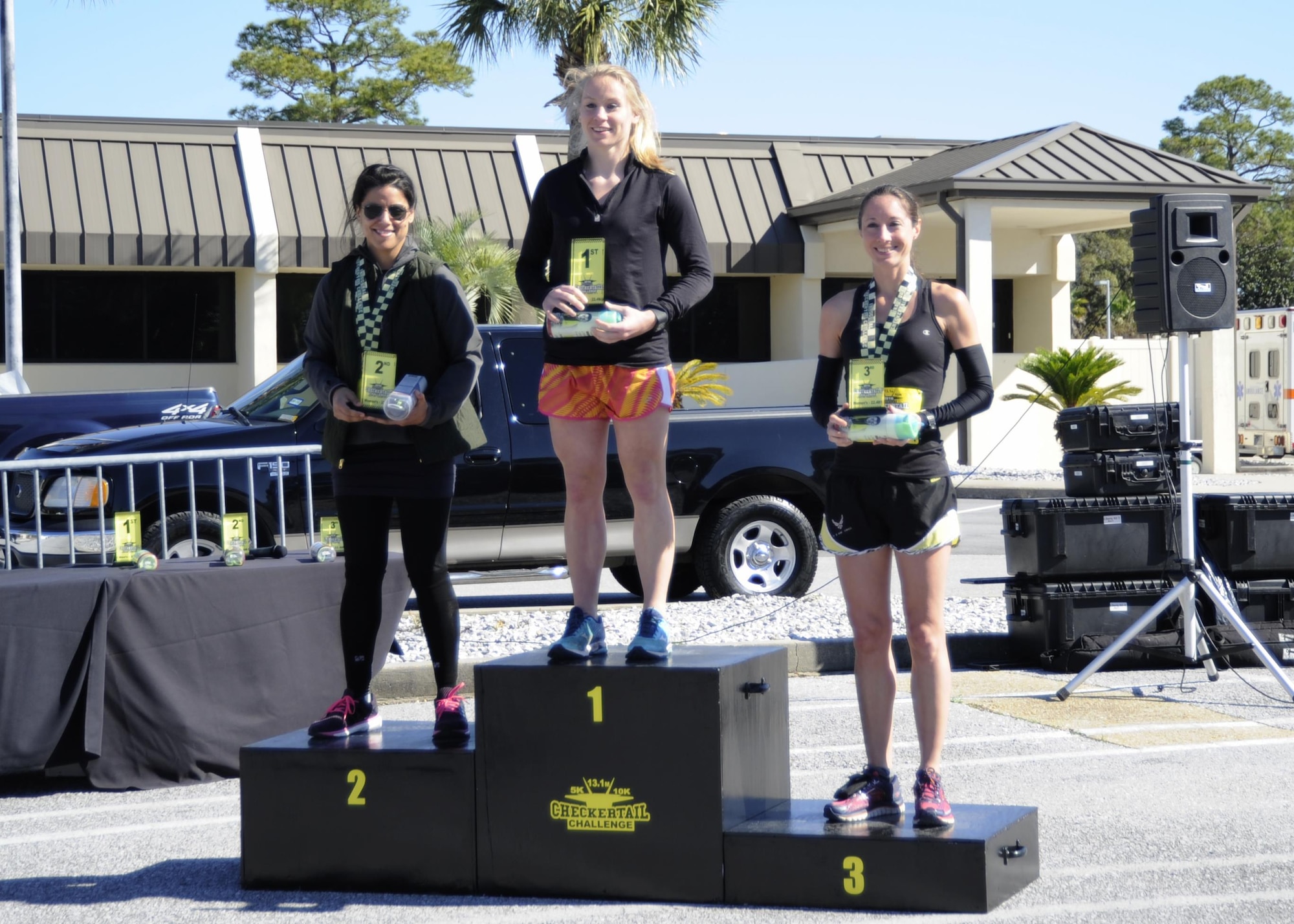(From left to right:) Master Sgt. Aminah Meho, 325th Communication Squadron client systems and knowledge operations section chief,   Ms. Michelle Churchman and Ms. Stacey Kidd. This event was a large-scale coordination effort composed of organizations from across the installation, and it took almost four months to coordinate and execute. (U.S.  Air Force photo by Senior Airman Solomon Cook/Released)
