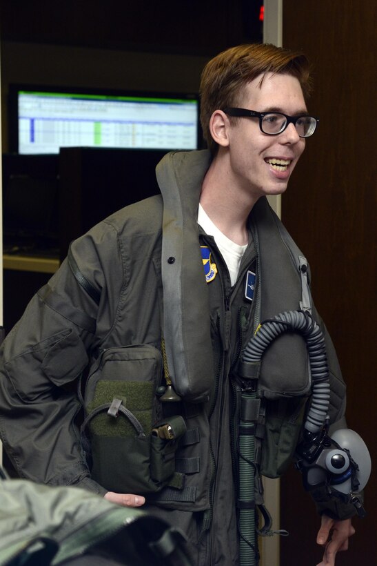 Zach "Z-man" Anderson, 16, poses with F-35 Lightning II gear during his tour of the 62nd Fighter Squadron at Luke Air Force Base, Ariz., April 7, 2016. Anderson received the tour as part of the pilot for a day program, which provides children who have serious or chronic illnesses an opportunity to be part of a flying squadron for an entire day. (U.S. Air Force photo by Senior Airman Devante Williams)