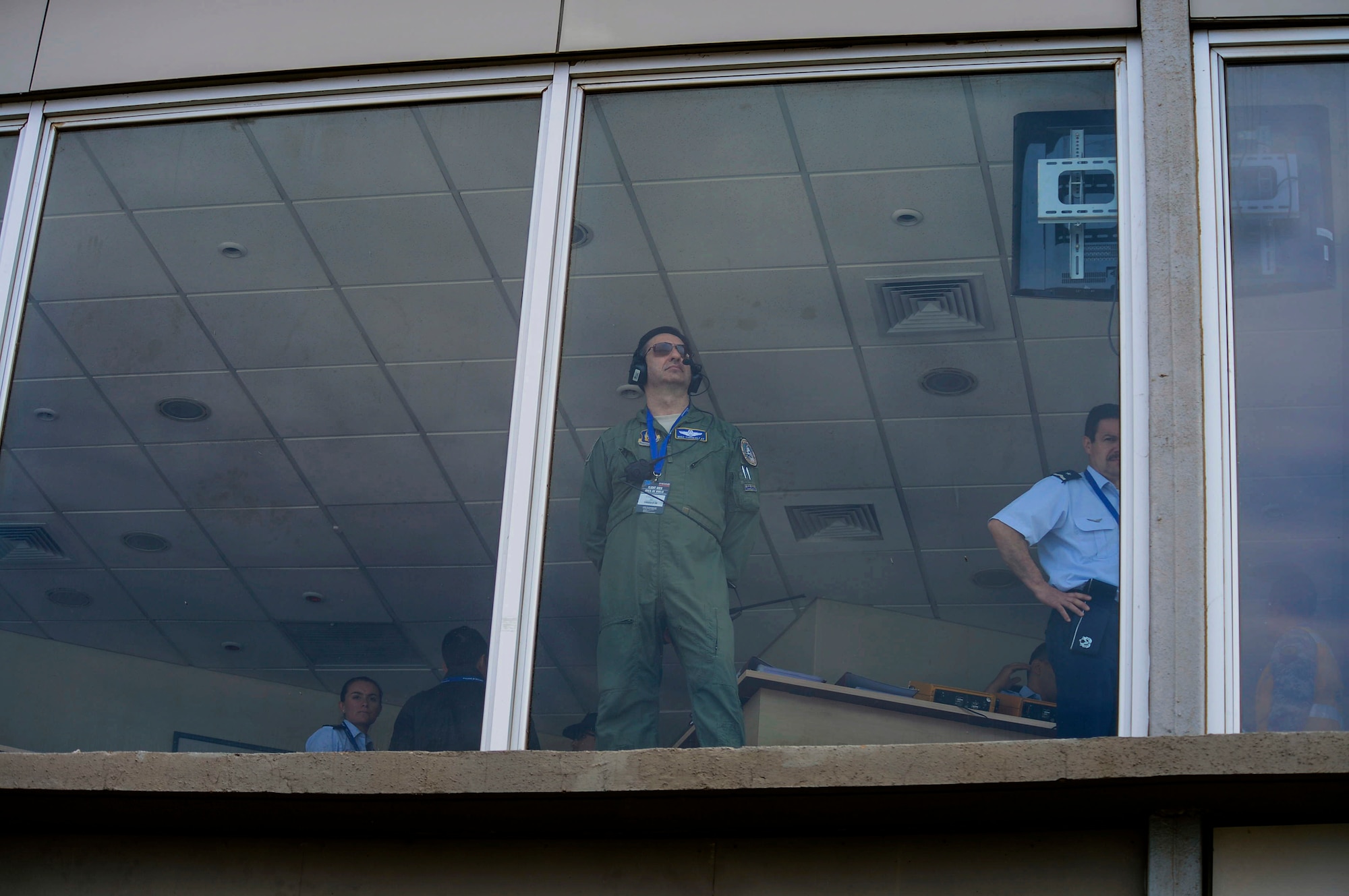 U.S. Air Force Col. Mike Torrealday, Reserve Advisor to the 12th AF (AFSOUTH) Commander and AFSOUTH mission commander for FIDAE, watches the certification demonstrations for the 2016 International Air and Space Fair (FIDAE) in Santiago, Chile, March 28, 2016. Airmen from around the U.S. are scheduled to participate in a variety of activities during the week-long air show that includes aerial demonstrations, interaction with the local community, and subject matter expert exchanges with the Chilean air force. (U.S. Air Force photo by Tech. Sgt. Heather Redman/Released)