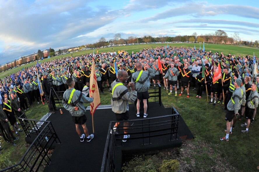 Garrison Commander, Colonel Brian Foley, gives his final remarks at the end of the 2016 Sexual Assault, Awareness and Prevention Month garrison run April 8, 2016 at Fort George G. Meade, Md. There were over 1,900 joint service members participating in the SAAPM event. (U.S. Air Force photo/Staff Sgt. Alexandre Montes)