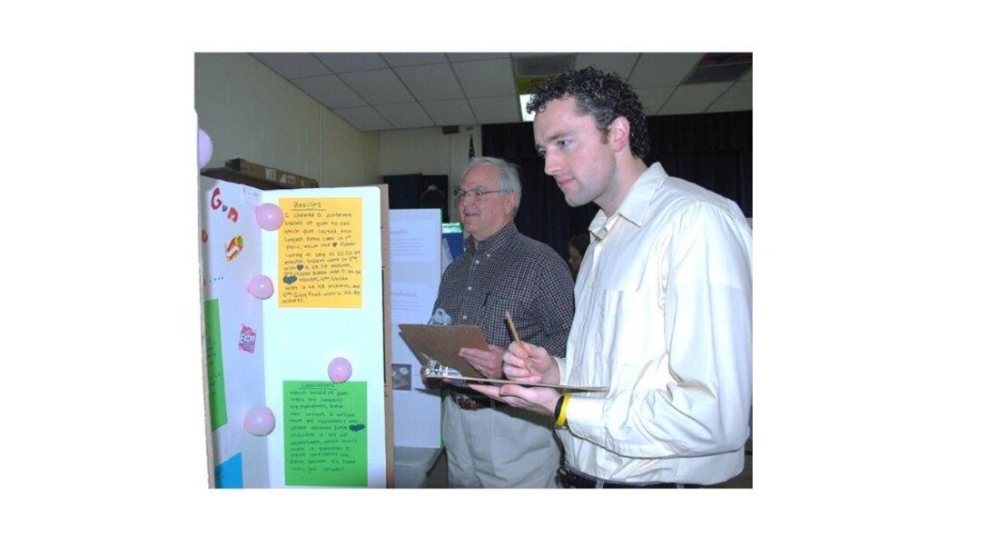 Engineer Research and Development Center volunteers joined fellow judges and evaluated more than 200 science fair projects at Mississippi’s Bovina Elementary School Feb. 4- 5 in such categories as chemistry, botany, physics, engineering, computer science and mathematics.  ERDC Education Outreach Coordinator Rick Tillotson, left, and Environment Laboratory’s Dr. Jonathon Brame scored projects for creative ability, scientific thought, thoroughness, skill and clarity. Brame recently starred in the Vicksburg Theater Guild’s production of “Mary Poppins” in the role of Bert, the chimney sweeper.