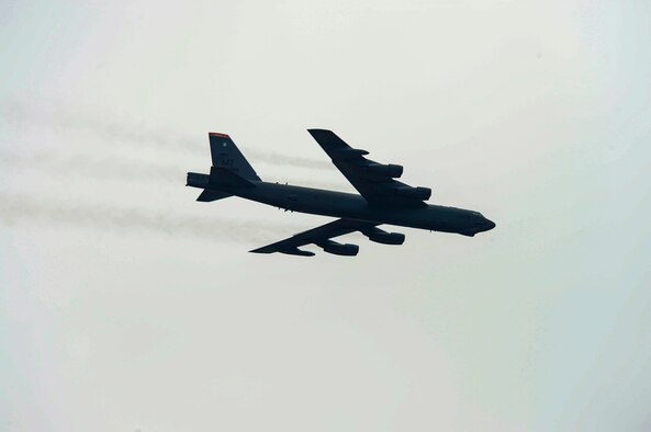 A B-52 Stratofortress from Minot AFB, N.D, flies over the 2016 International Air and Space Fair (FIDAE) in Santiago, Chile, April 2, 2016. The flyover was part of a 27-hour, non-stop mission which included training with Colombian air forces and other South American military partners. The B-52 is a long-range, heavy bomber capable of flying a variety of missions and has an unrefueled combat range in excess of 8,800 miles.    (U.S. Air Force photo by Tech. Sgt. Heather Redman/Released)