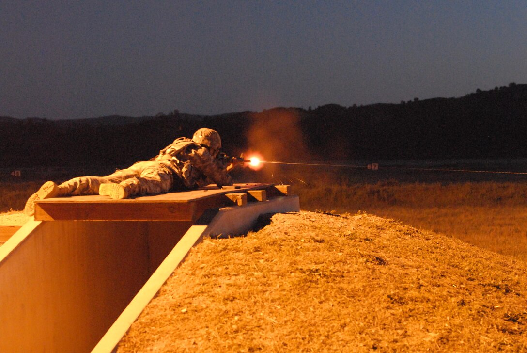 Spc. Jessie Guerrero, a soldier with the 151st Theater Information Operations Group fires the M16 during night qualification event at the U.S. Army Civil Affairs and Psychological Operations Command (Airborne) Best Warrior Competition at Fort Hunter Liggett, Calif. April 5, 2016. The winner of the competition moves on to represent the command at the U.S. Army Reserve Command Best Warrior Competition later this year. (U.S. Army photo by Capt. James Orth, 351st CACOM)