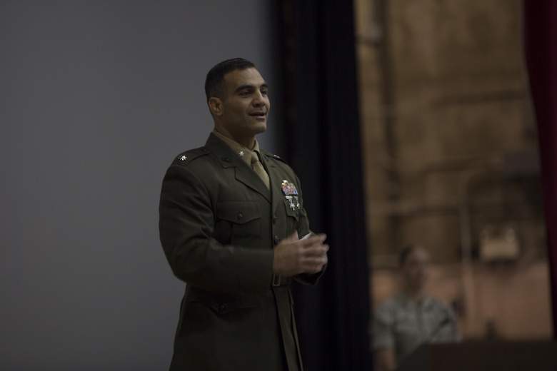 Lt. Col. Speros Koumparakis, commanding officer, Communication Training Battalion, addresses the crowd during the Basic Communications Officer Course 1-16 graduation at the base theater April 1, 2016. (Official Marine Corps Photo by Cpl. Julio McGraw/Released)