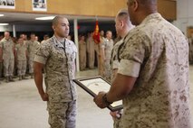 Tucson, Ariz.-Native Luis A. Ochoa, an embarker with Chemical Biological Incident Response Force is promoted to the rank of staff sergeant during a ceremony at Chemical Biological Incident Response Force (CBIRF) headquarters aboard Naval Support Facility Indian Head, Md., April 4, 2016. When directed, CBIRF forward-deploys and/or responds with minimal warning to a chemical, biological, radiological, nuclear and high yield explosive (CBRNE) threat or event in order to assist local, state, or federal agencies and the geographic combatant commanders in the conduct of CBRNE response or consequence management operations, providing capabilities for command and control; agent detection and identification; search, rescue, and decontamination; and emergency medical care for contaminated personnel. (Official USMC Photos by Sgt. Jonathan Herrera)