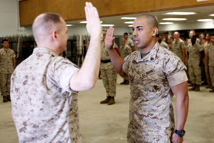 Tucson, Ariz.-Native Luis A. Ochoa, an embarker with Chemical Biological Incident Response Force is promoted to the rank of staff sergeant during a ceremony at Chemical Biological Incident Response Force (CBIRF) headquarters aboard Naval Support Facility Indian Head, Md., April 4, 2016. When directed, CBIRF forward-deploys and/or responds with minimal warning to a chemical, biological, radiological, nuclear and high yield explosive (CBRNE) threat or event in order to assist local, state, or federal agencies and the geographic combatant commanders in the conduct of CBRNE response or consequence management operations, providing capabilities for command and control; agent detection and identification; search, rescue, and decontamination; and emergency medical care for contaminated personnel. (Official USMC Photos by Sgt. Jonathan Herrera)