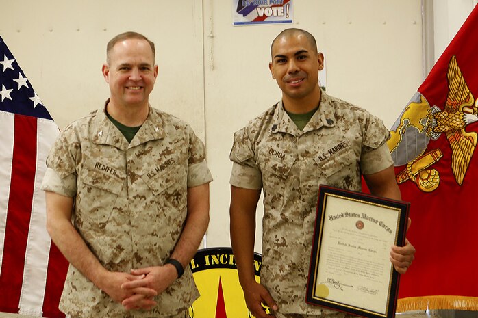 Tucson, Ariz.-Native Luis A. Ochoa, an embarker with Chemical Biological Incident Response Force is promoted to the rank of staff sergeant during a ceremony at Chemical Biological Incident Response Force (CBIRF) headquarters aboard Naval Support Facility Indian Head, Md., April 4, 2016. When directed, CBIRF forward-deploys and/or responds with minimal warning to a chemical, biological, radiological, nuclear and high yield explosive (CBRNE) threat or event in order to assist local, state, or federal agencies and the geographic combatant commanders in the conduct of CBRNE response or consequence management operations, providing capabilities for command and control; agent detection and identification; search, rescue, and decontamination; and emergency medical care for contaminated personnel. (Official USMC Photos by Sgt. Jonathan Herrera)