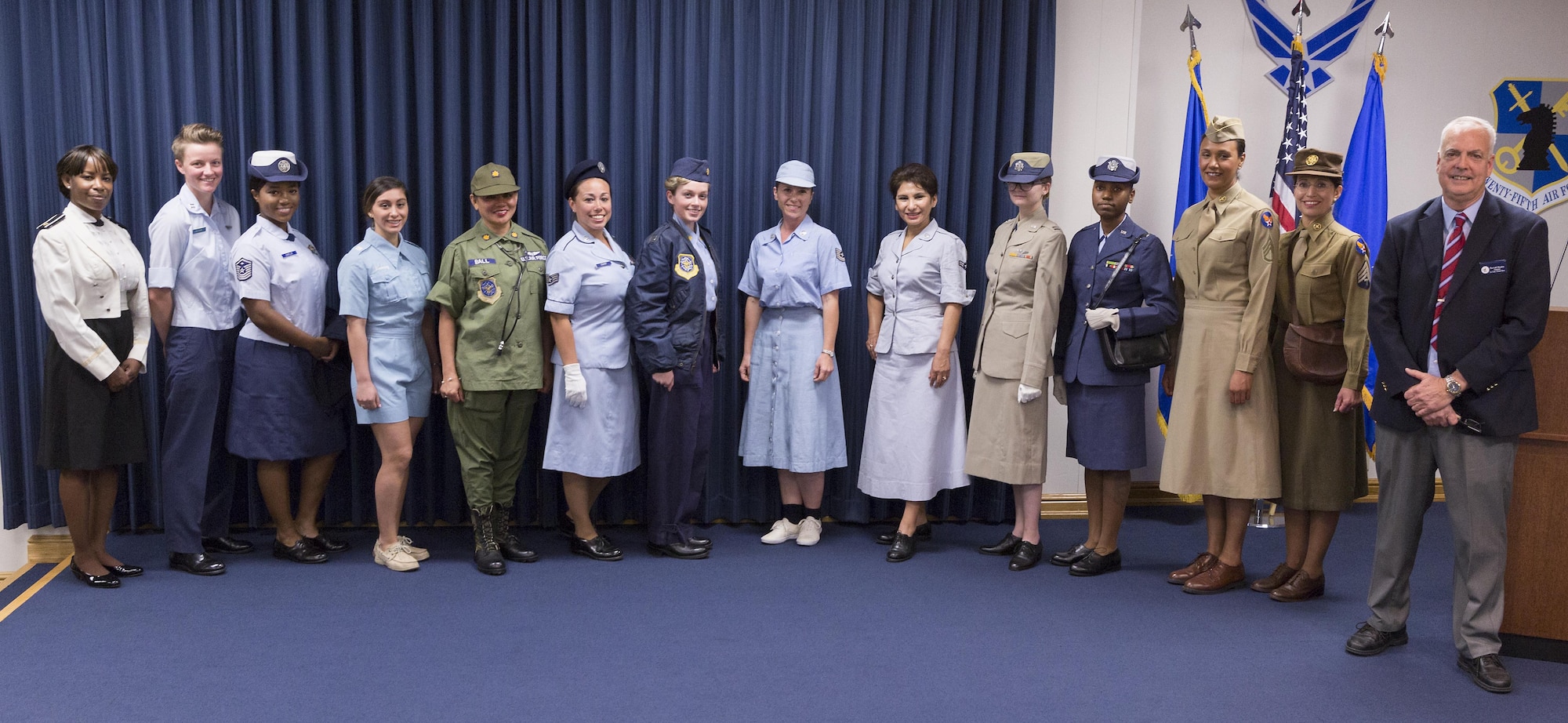 Lt. Col. (retired) David Shultz, right, stands with the 25 AF volunteers who modeled U.S. Air Force women’s vintage uniforms during the Women’s History Month event March 28. Shultz owns and curates the uniforms as part of his Air Force heritage exhibit, some of which is displayed at the Texas Air Museum on Stinson Field, San Antonio, Texas. (U.S. Air Force Photo/Guido Locati, 25 AF/PA)
