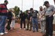Several members of the 335th Tactical Fighter Squadron reunion tour gather at the F-15E Strike Eagle memorial fountain, April 1, 2016, at Seymour Johnson Air Force Base, North Carolina. Each brick is inscribed with the name of a hero from the installation’s history. (U.S. Air Force photo/Airman 1st Class Aaron J. Jenne)