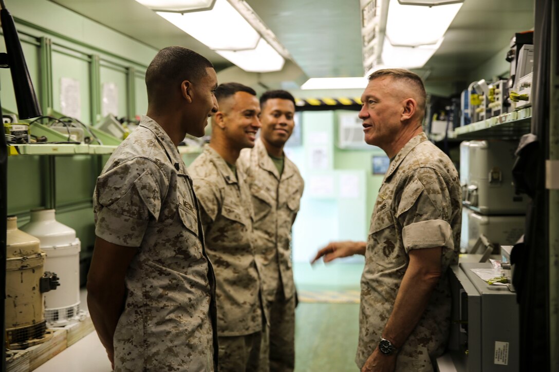 Lt. Gen. Jon Davis, deputy commandant of Marine Corps Aviation, talks to Marines with Marine Aviation Logistics Squadron (MALS) 16 during the “Boots on the Ground” event aboard Marine Corps Air Station Miramar, Calif., April 5. “Boots on the Ground” allows senior leaders the opportunity to tour squadrons, meet with maintenance personnel and discuss how to better support aviation readiness requirements. (U.S. Marine Corps photo by Cpl. Alissa P. Schuning/Released)