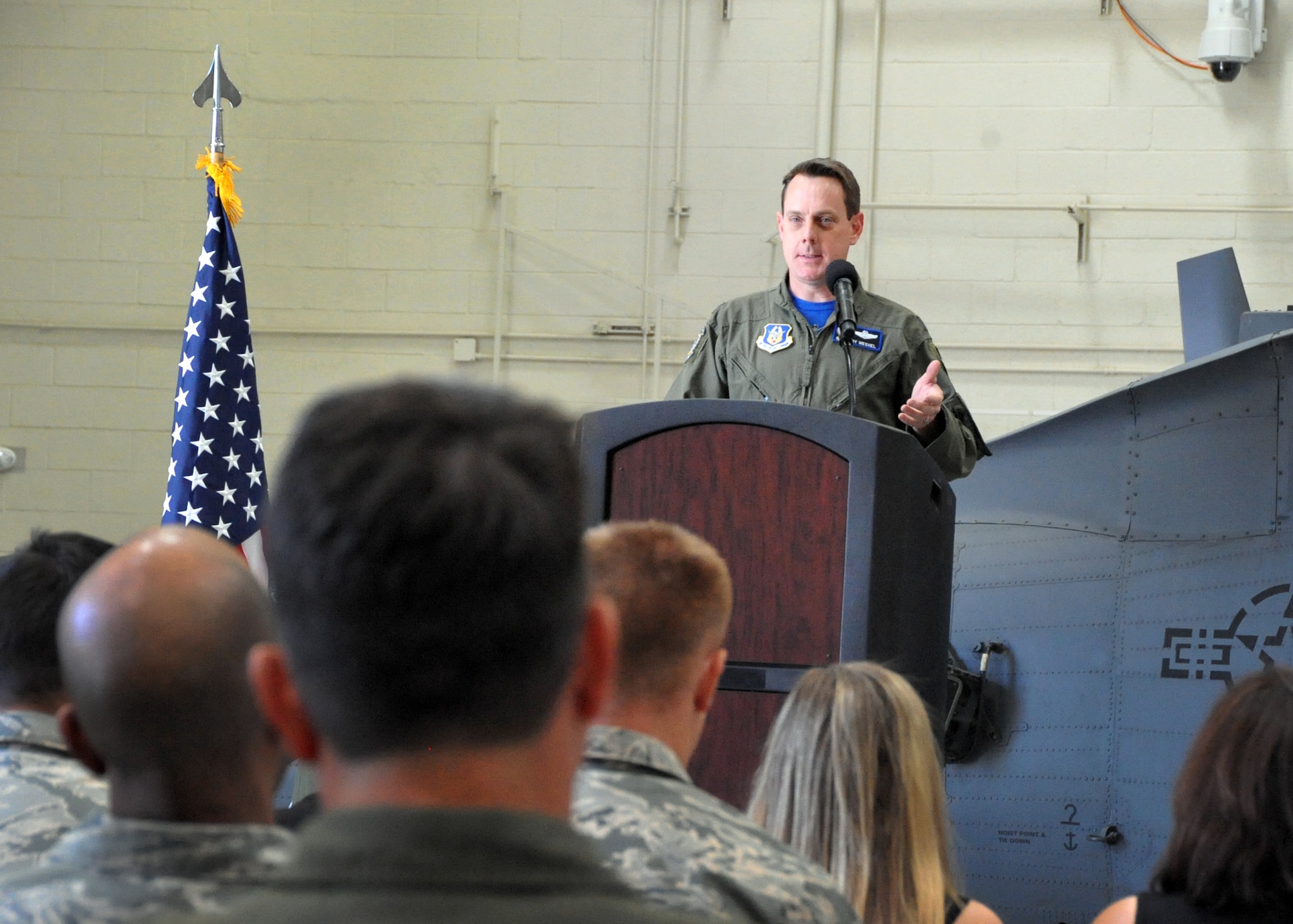 U.S. Air Force Reserve Lt. Col. Andrew Meshel, a Tucson attorney and prior Navy man, addresses the 305th Rescue Squadron in a ceremony April 3 at the 943rd Maintenance Squadron hangar. (U.S. Air Force photo/Tech. Sgt. Carolyn Herrick)