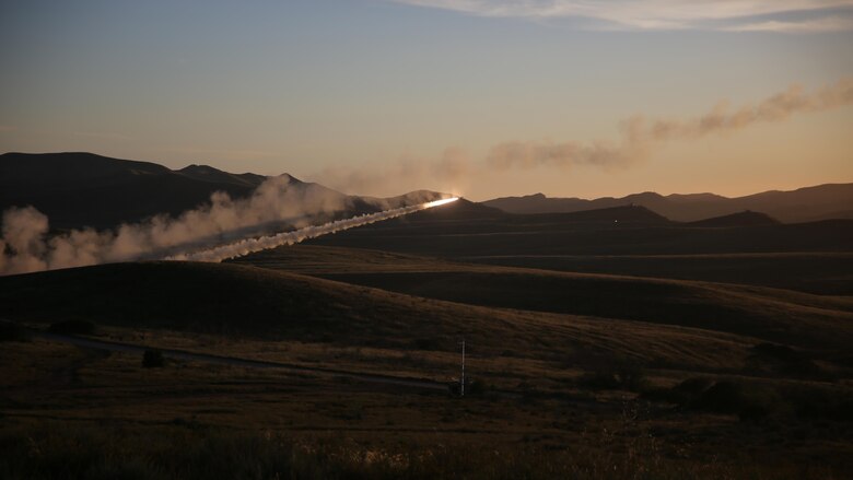 A high mobility artillery rocket soars through the air during Spring Fire Exercise at Marine Corps Base Camp Pendleton, California, March 31, 2016. Since its origin, the 11th Marine Regiment has served as the Marine Corps’ long-range artillery threat, able to engage targets from miles away in support of the ground combat element