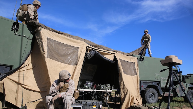 Marines with Battery Q, 5th Battalion, 11th Marine Regiment, I Marine Expeditionary Force, set up the fire direction center during Spring Fire Exercise at Marine Corps Base Camp Pendleton, California, March 31, 2016. To ensure readiness, fire missions were coordinated and called at random intervals by the headquarters element. The Marines manning the artillery weapons were ready to fire swiftly and accurately upon command during the combined-arms training exercise.