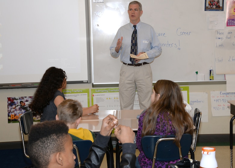 Mike Mollineaux, U.S. Army Engineering and Support Center Huntsville Engineering Directorate, speaks to Ms. Blume's fifth grade students during Mill Creek Elementary School's career day April 8. 