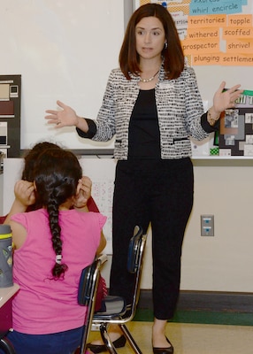 Jennifer McDowell, a U.S. Army Engineering and Support Center Huntsville Interior Designer, speaks to Ms. Pratt's fourth grade students about the differences between an interior designer and an interior decorator during Mill Creek Elementary School's career day April 8.