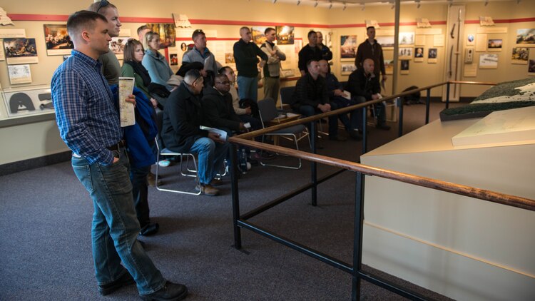 Marines with the Expeditionary Warfare School battle site study group watch a miniature reconstruction of the Battle of Saratoga during their trip to Saratoga Springs, New York, April 5, 2016. The Marines visited the battlefield to learn more about the tactics and decisions of military officers from the Revolutionary War.
