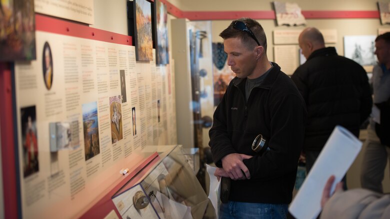 Capt. Shawn Conner, a student at the Expeditionary Warfare School, reads information about the Revolutionary War during his trip to Saratoga Springs, New York, April 5, 2016. Conner is one of many Marines who attended the battle site visit to the Battle of Saratoga.