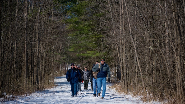 Marines with the Expeditionary Warfare School battle site study group make their way to the battlefield of the Battle of Saratoga during their trip to Saratoga Springs, New York, April 5, 2016. During the hike, the Marines would stop at key point on the battlefield to talk about the tactics and decisions of the past officers in the Revolutionary War.