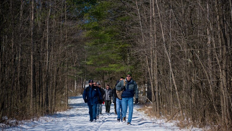 Marines with the Expeditionary Warfare School battle site study group make their way to the battlefield of the Battle of Saratoga during their trip to Saratoga Springs, New York, April 5, 2016. During the hike, the Marines would stop at key point on the battlefield to talk about the tactics and decisions of the past officers in the Revolutionary War.