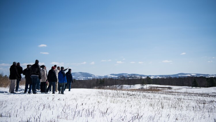 The Marines with the Expeditionary Warfare School battle site study group make a short stop to talk about the terrain of the battlefield and about what kind of tactics the officers of the Revolutionary War used during their trip to Saratoga Springs, New York, April 5, 2016. The Marines talked about tactics such as reverse slope defense versus forward slope defense, and cover versus concealment.