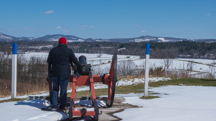 Gunnery Sgt. Lennel Johnson, a Marine from the Enlisted Professional Military Education School, observes how the Continental Army used the terrain against the British Forces as part of his visit to Saratoga Springs, New York on April 5, 2016. The hill that Johnson was on provide the Americans with a overviewing advantage, which they used to force the British forces into the tree line where they would have a harder time moving their troops and equipment.
