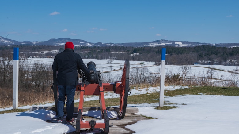Gunnery Sgt. Lennel Johnson, a Marine from the Enlisted Professional Military Education School, observes how the Continental Army used the terrain against the British Forces as part of his visit to Saratoga Springs, New York on April 5, 2016. The hill that Johnson was on provide the Americans with a overviewing advantage, which they used to force the British forces into the tree line where they would have a harder time moving their troops and equipment.
