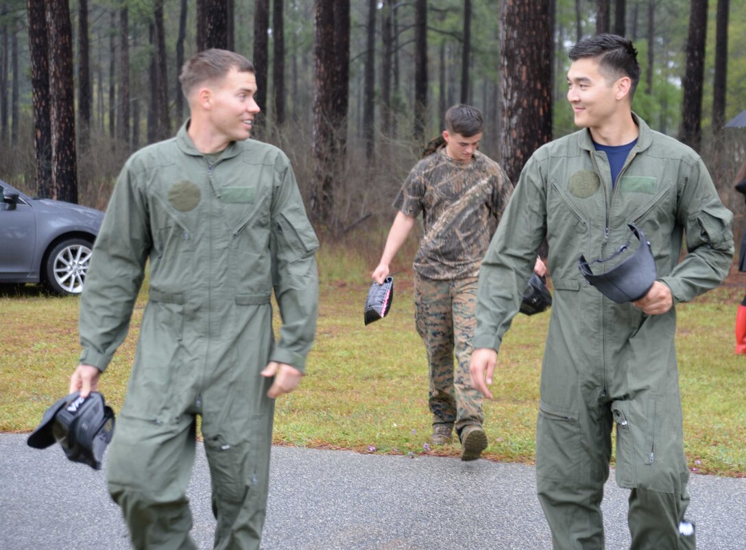Paintball champions, 1st Lt. Benjamin Welch (left), Capt. Sean Fitzgibbons, and three teammates won the final round in a recent tournament at Marine Corps Logistics Base Albany. The event was the second of three activities held on the installation to raise money during the Navy-Marine Corps Relief Society’s Fund Drive. The five-man team’s marksmanship skills landed them first-place and bragging rights over all of the opponents the faced in the fundraising paintball tournament.