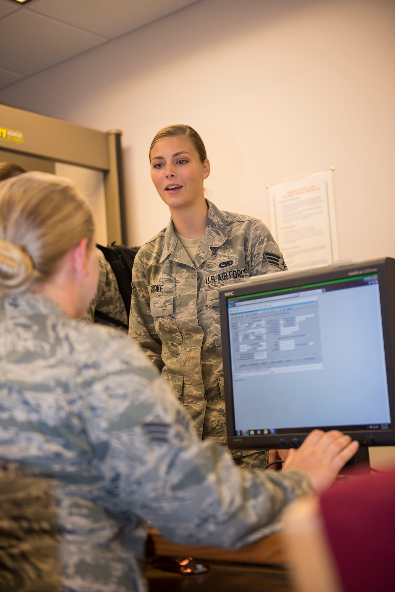U.S. Air Force Senior Airman Robin Burke, 23d Aircraft Maintenance Squadron A-10C Thunderbolt II crew chief, goes through a deployment line, July 16, 2015, at Moody Air Force Base, Ga. Airmen from the 23d Logistics Readiness Squadron’s Deployment Control Center are responsible for planning and organizing assets and people to ensure they are in their proper designated areas when needed during transport. (U.S. Air Force photo by Airman 1st Class Greg Nash/Released) 
