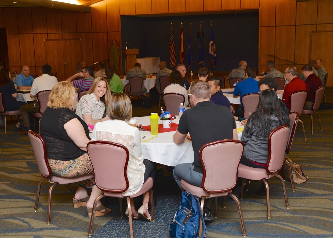 Attendees of the Air National Guard Chaplain Corps Strong Bonds training seminar listen to a guest speaker at the Horizons Club here April 5, 2016. Strong Bonds is a unit-based, chaplain-led program that assists commanders in building individual resilience by strengthening the military family. (U.S. Air Force courtesy photo/Released)