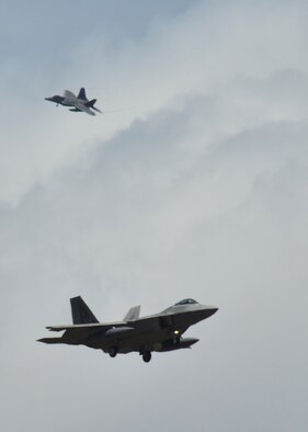 F-22 Raptors prepare to land on Joint Base Pearl Harbor-Hickam for the first time is six months as they return from a deployment to the Central Command area of responsibility, Joint Base Pearl Harbor-Hickam, April 8, 2016. The Hawaiian raptors are made up of F-22 pilots from the 199th Fighter Squadron and the active-duty 19th Fighter Squadron and are supported by the Hawaii Air National Guard’s 154th Maintenance Squadron and the active-duty 15th Maintenance Squadron. This marked the first operational deployment for the Hawaiian Raptors. (U.S. Air Force photo by Tech. Sgt. Aaron Oelrich/released) 