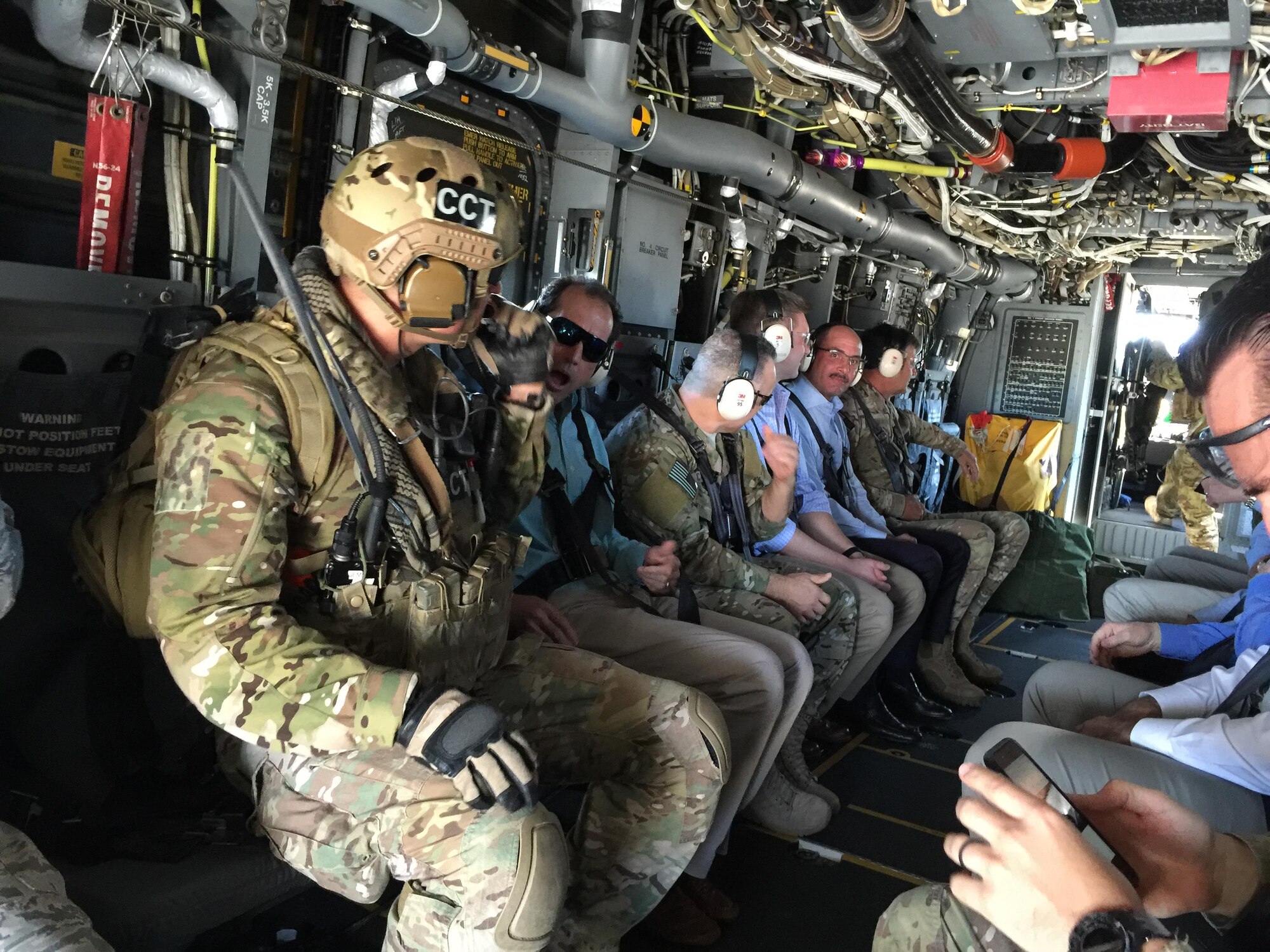 Business executives, hosted by Lt. Gen. Brad Heithold, fly alongside Air Commandos out to Eglin range A-78 for an air power demonstration. This group of 17 civilians received a hands-on look into the Air Force Special Operations Command mission and Airmen. (U.S. Air Force photo / Dawn Hart)