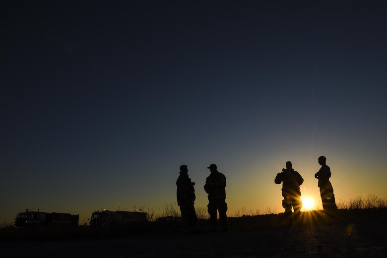 A group of firefighters with the 1st Special Operations Civil Engineer Squadron prepare for a firefighting exercise at Hurlburt Field, Fla., April 5, 2016. Hurlburt Field firefighters transform training and exercise throughout the year to remain ready for emergency responses. (U.S. Air Force photo by Staff Sgt. Christopher Callaway) 