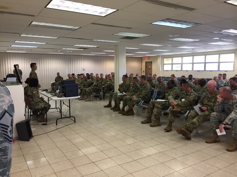 Members from the 259th Human Relations Company brief the U.S. Army 25th Infantry Division on deployment in-processing procedures, March 24, at Hickam's Passenger Terminal. (Courtesy Photo)