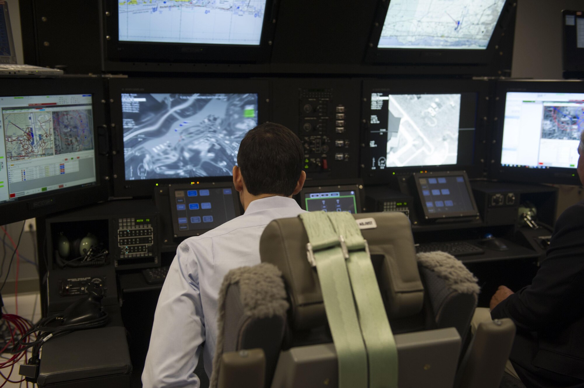 Todd Stein, a participant in the Business Executive for National Security tour, sits at the remotely-piloted aircraft station in the 19th Special Operations Squadron training facility at Hurlburt Field, Florida.  The 17-person BENS group spent a day getting an orientation with Air Force Special Operations Command missions and Air Commandos.  (U.S. Air Force photo/Senior Airman Krystal M. Garrett)