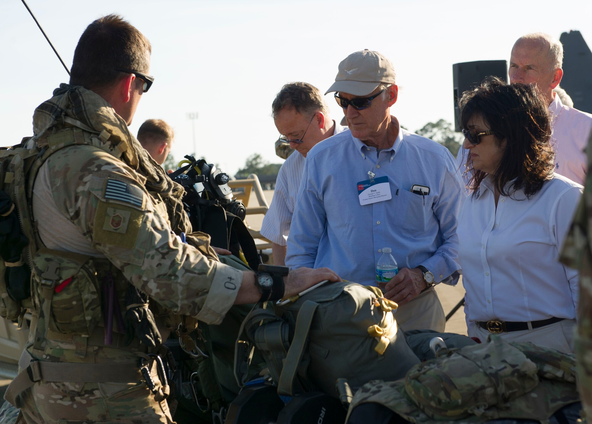 Don Smith and Adair Schwartz review special tactics equipment during the Business Executives for National Security tour at Hurlburt Field, Fla., April 7, 2016.The 17-person BENS group spent a day getting an orientation with Air Force Special Operations Command missions and Air Commandos.  (U.S. Air Force photo by Senior Airman Krystal M. Garrett)