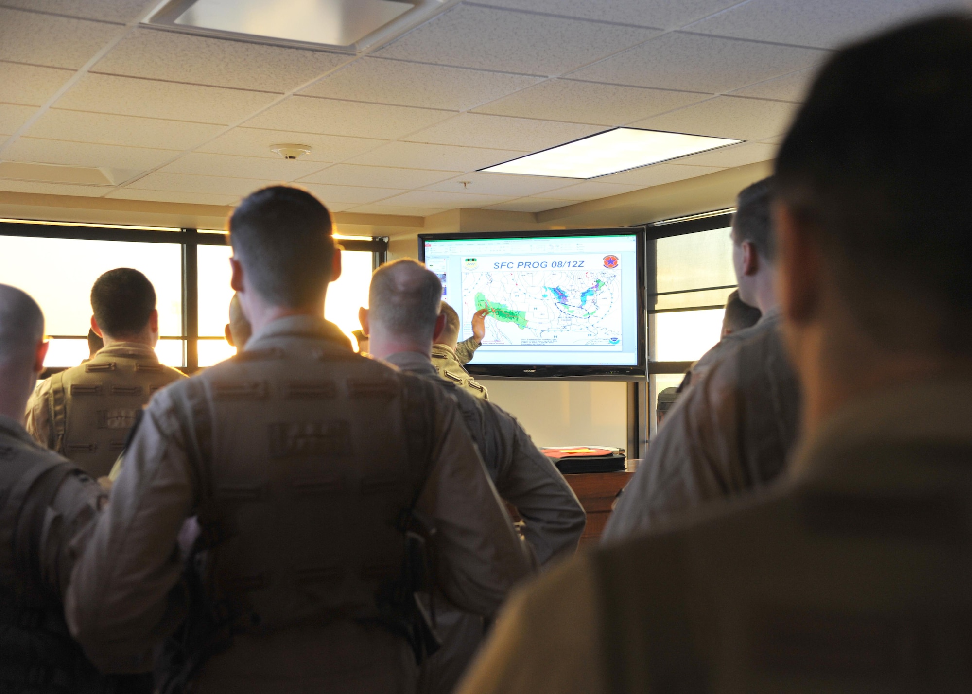 B-52 Stratofortress aircrew receive a final pre-flight brief prior to boarding their aircraft at Barksdale Air Force Base, La., April 8. The aircraft and their crews deployed to Al Udeid Air Base, Qatar, in support of ongoing operations in U.S. Central Command’s area of responsibility. The B-52 is a highly-capable long-range bomber that has similar capabilities to the B-1B Lancers previously based at Al Udeid. (U.S. Air Force photo/Senior Airman Joseph Raatz)