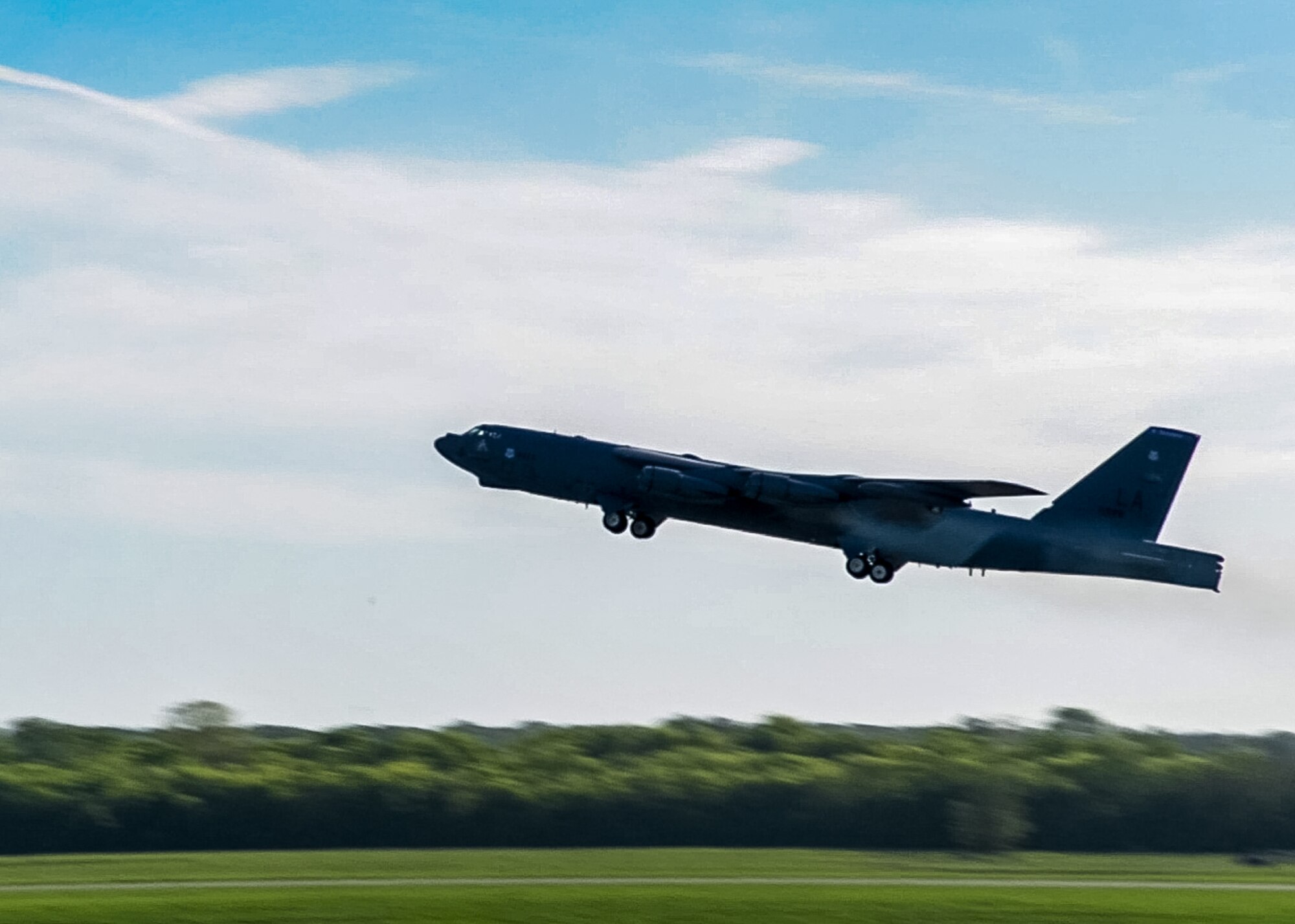 A B-52 Stratofortress takes off from Barksdale Air Force Base, La., April 8, en route to Al Udeid Air Base, Qatar. Several B-52s deployed to Qatar in support of ongoing operations in U.S. Central Command’s area of responsibility, including eliminating the ISIL terrorist group and the threat they pose to Iraq, Syria and the wider international community. This deployment assists in satisfying manned strike requirements for continued operations in the area. (U.S. Air Force photo/Senior Airman Joseph Raatz)