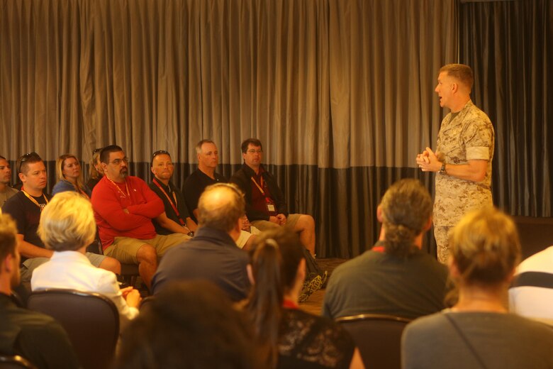 Col. Jason Woodworth, commanding officer of Marine Corps Air Station Miramar, welcomes educators from high schools within recruiting stations Lansing, Mich., and Twin Cities, Minn., districts during an Educators Workshop aboard MCAS Miramar, Calif., April 6. Educators visited MCAS Miramar to learn about the aviation side of the Marine Corps and life for a Marine after basic training.