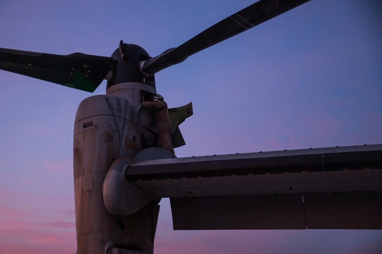 Cpl. Jesus Ontiveros, a crew chief with Marine Medium Tiltrotor Squadron (VMM) 364 “Purple Foxes,” and an Oxnard, Calif., native, helps conduct the post-operation check of an MV-22B Osprey aboard Marine Corps Air Station Camp Pendleton, Calif., April 5. Marines with VMM-364 conduct post-operation checks to ensure the aircraft operates properly or to address any discrepancies the flight may have produced. (U.S. Marine Corps photo by Sgt. Lillian Stephens/Released)