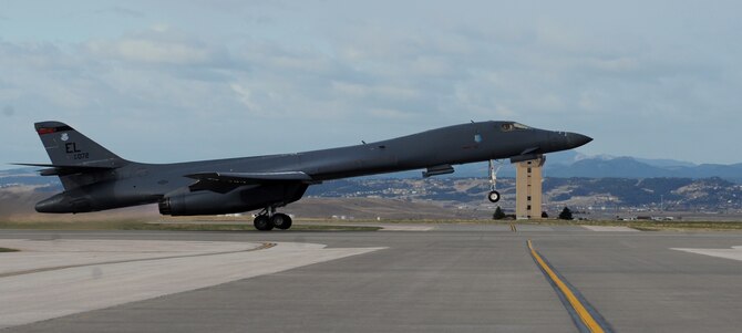 A B-1 bomber assigned to the 34th Bomb Squadron takes off at Ellsworth Air Force Base, S.D., to participate in a Green Flag exercise at Nellis AFB, Nevada, April 7, 2016. Green Flag provides realistic training with more than 75 aircraft flying in various combat scenarios, preparing U.S. forces to fight in a high-tech combat environment. (U.S. Air Force photo by Airman 1st Class Denise M. Nevins/Released)