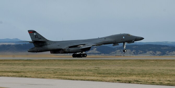 A B-1 bomber assigned to the 34th Bomb Squadron takes off at Ellsworth Air Force Base, S.D., to participate in a Green Flag exercise at Nellis AFB, Nevada, April 7, 2016. The B-1 is able to deliver large quantities of precision and non-precision weapons against any adversary, anywhere in the world. (U.S. Air Force photo by Airman 1st Class Denise M. Nevins/Released)