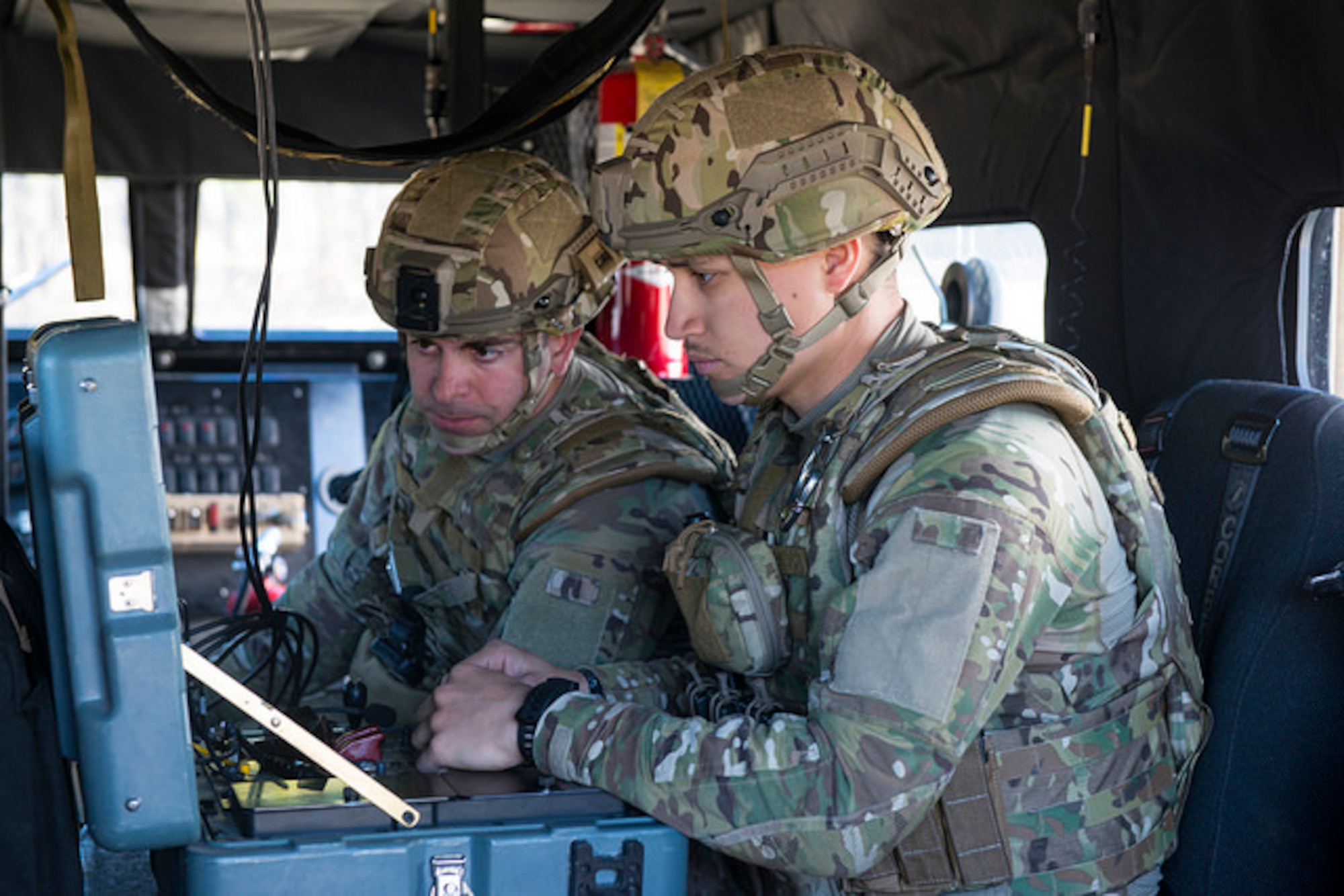 Explosive ordnance disposal technicians remote control an EOD robot during Joint IED training on Joint Base McGuire-Dix-Lakehurst, N.J. March 29. Air Force and Marine Corps technicians from JB MDL, Dover Air Force Base, Delaware and Joint Base Langley-Eustis, Virginia participated in the training.