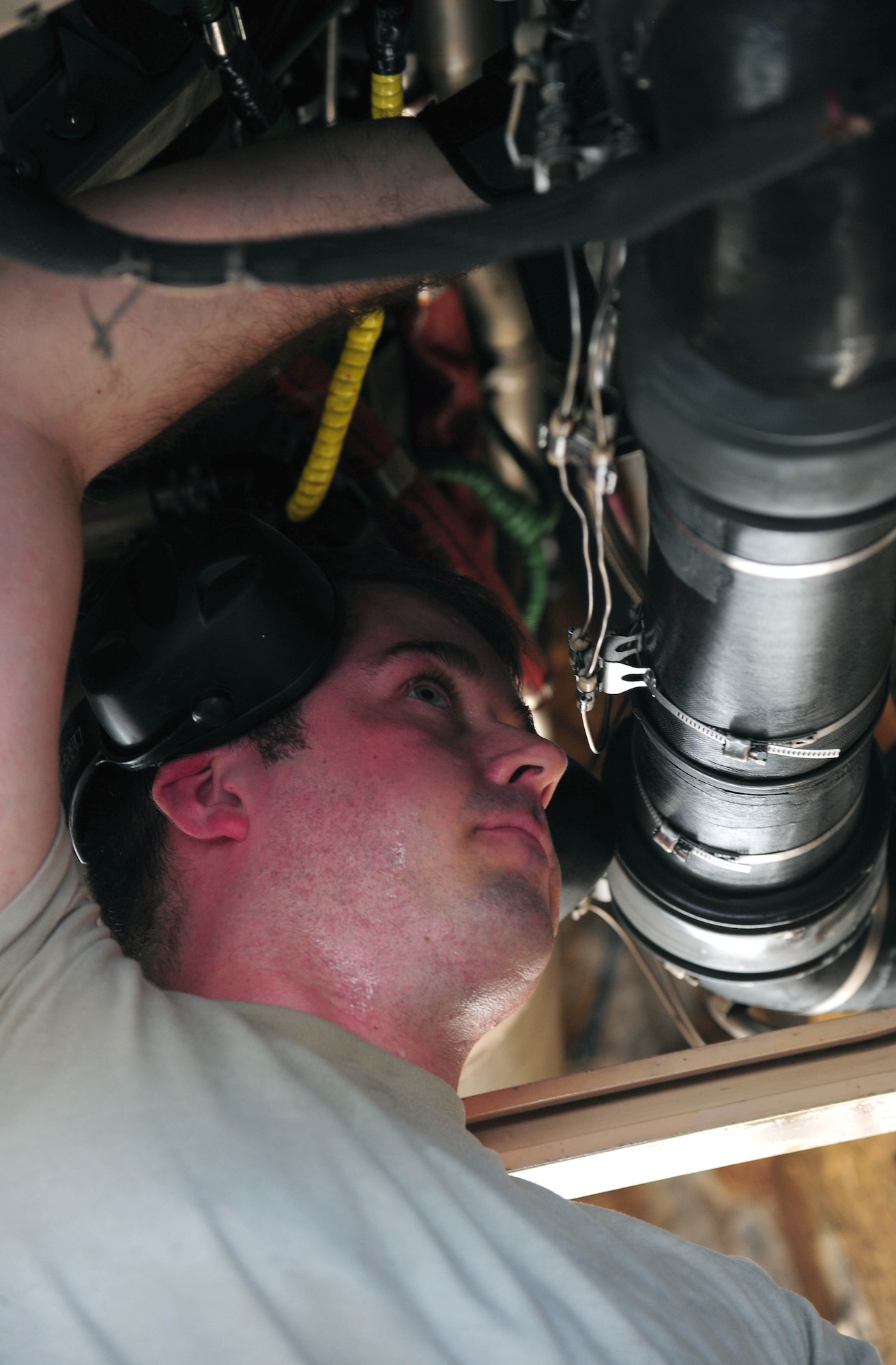 U.S. Air Force Staff Sgt. James Torrance, an electrical and environmental systems technician with the 131st Aircraft Maintenance Squadron, performs maintenance on a U.S. Air Force B-2 Spirit bomber, March 11, 2016, in the U.S. Pacific Command area of operations. These deployments help maintain global stability and security while enabling aircrew to become familiar with operating in different regions. (U.S. Air Force photo by Senior Airman Joel Pfiester/Released)