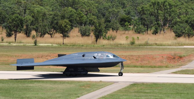A U.S. Air Force B-2 Spirit bomber lands at Royal Australian Air Force Base Tindal, Australia, March 22, 2016, in order to perform an engine running crew change. The B-2 was one of three that were deployed to the Indo-Asia-Pacific region from March 8 through 29 to enhance bomber crew readiness and proficiency and to integrate capabilities with key regional partners. U.S. Strategic Command bombers regularly rotate through the Indo-Asia-Pacific region to conduct theater security cooperation engagements with U.S. allies and partners and demonstrate a shared commitment to promoting security and stability in the region (U.S. Air Force photo by Senior Airman Joel Pfiester/Released)