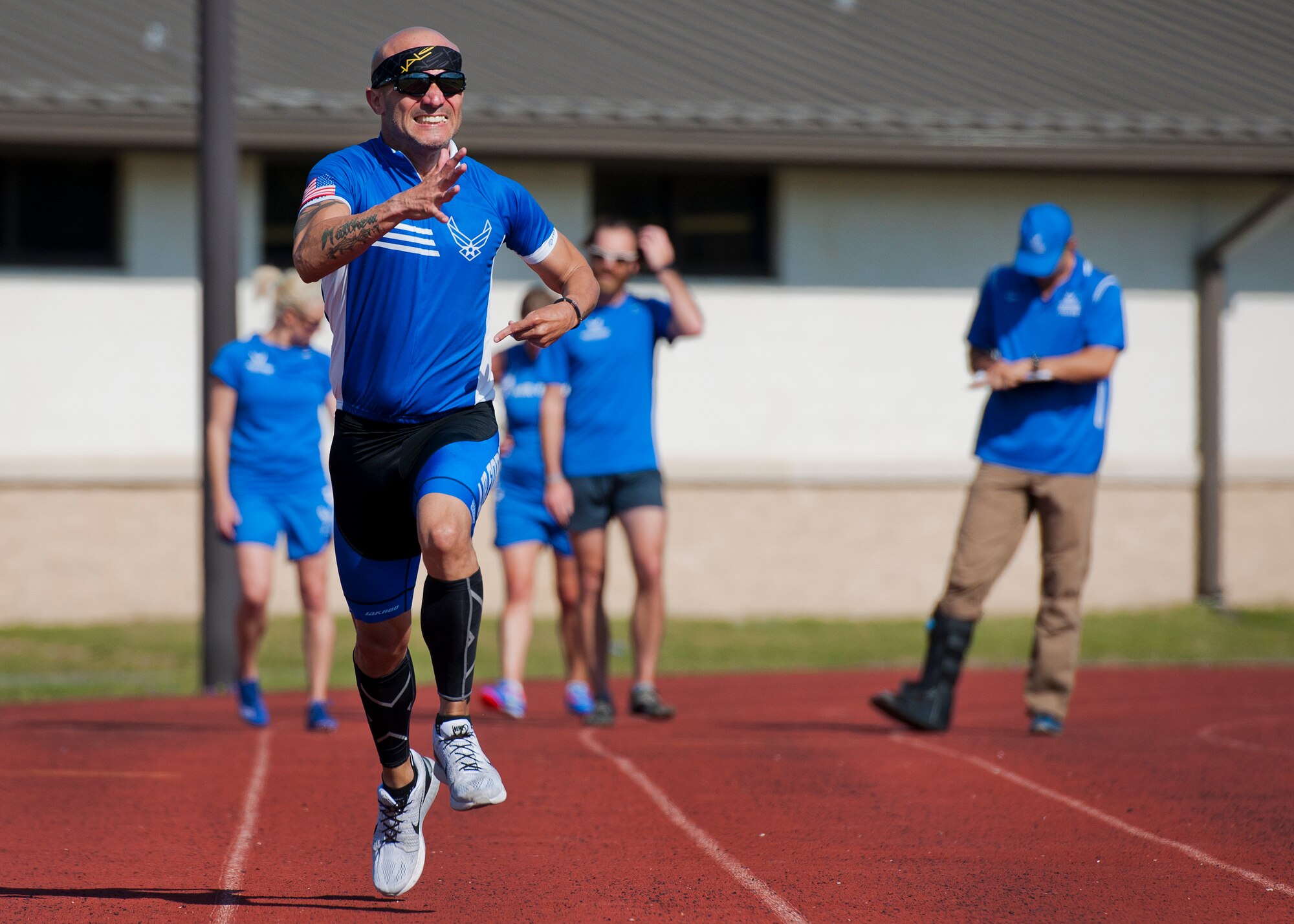 Rafael Sanchez-Romero, a Warrior Games athlete, practices sprinting during a morning track and field session at the Air Force team’s training camp at Eglin Air Force Base, Fla., April 7. The base-hosted, week-long Warrior Games training camp is the last team practice session before the yearly competition in June. (U.S. Air Force photo/Samuel King Jr.)