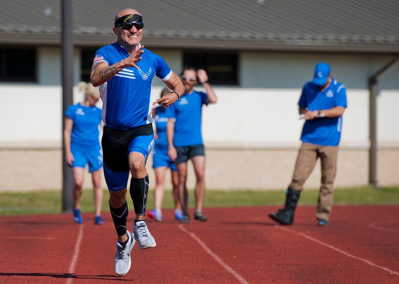 Rafael Sanchez-Romero, a Warrior Games athlete, practices sprinting during a morning track and field session at the Air Force team’s training camp at Eglin Air Force Base, Fla., April 7. The base-hosted, week-long Warrior Games training camp is the last team practice session before the yearly competition in June. (U.S. Air Force photo/Samuel King Jr.)